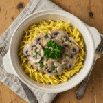 easy creamy mushroom stroganoff served with noodles